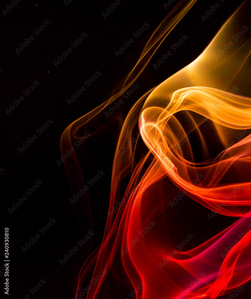 Obraz premium Colored smoke on black background