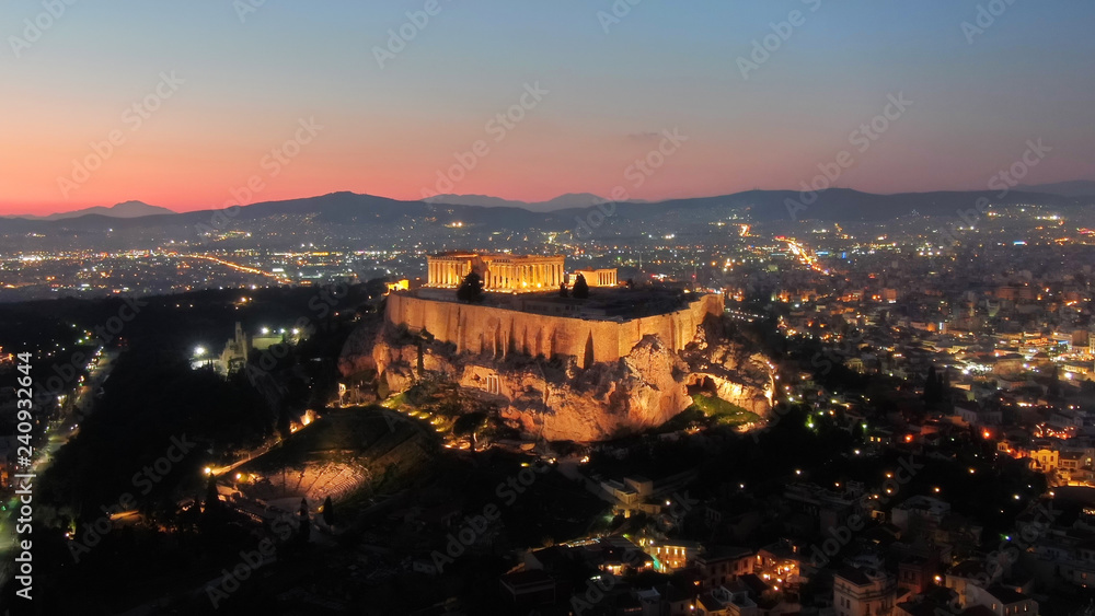 Aerial drone detail night shot of iconic Acropolis hill and the Parthenon a masterpiece of ancient Western civilisation, Athens historic centre, Attica, Greece