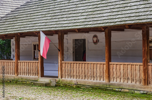 old house in the open-air museum polish flag