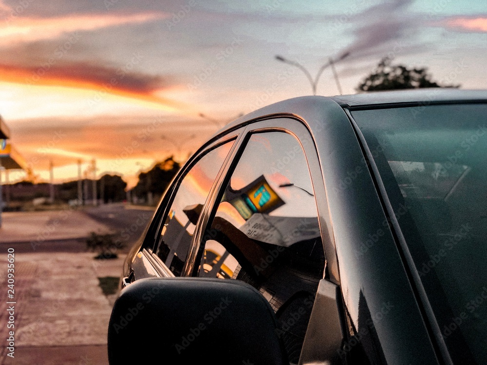 sunset on car