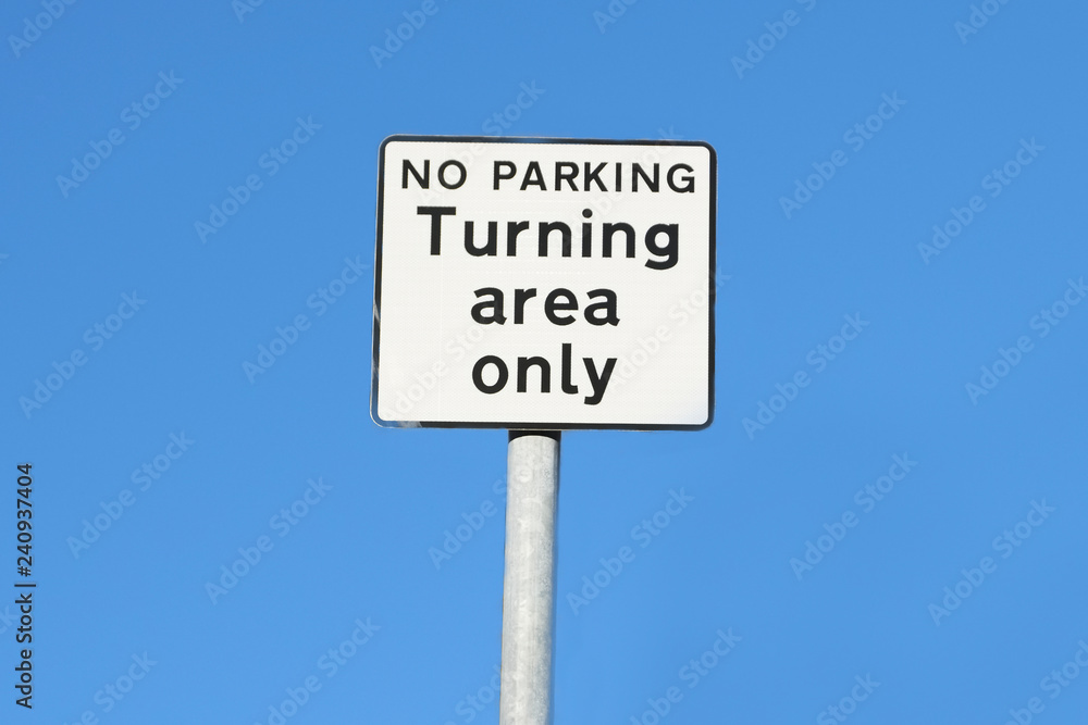 Turning area only no parking sign against blue sky Turning area only no parking sign against blue sky