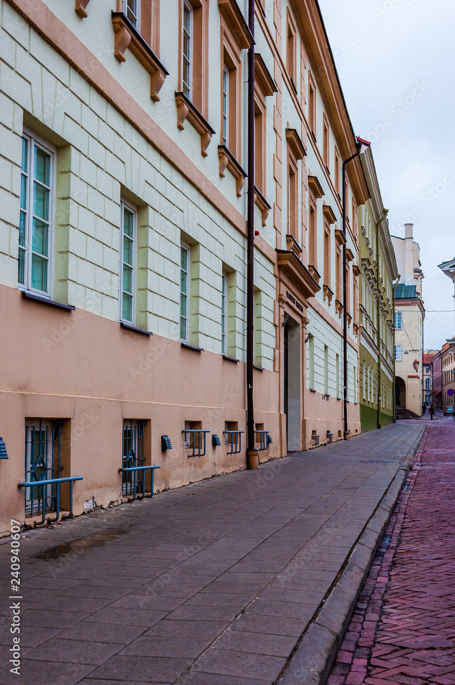 Stylish and cozy Universiteto street in Old Town of Vilnius. Classical European architecture street design