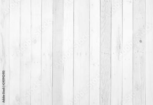 White wood surface with long boards lined up. Light wooden planks on a wall or floor with grain and neutral flat faded tones. photo