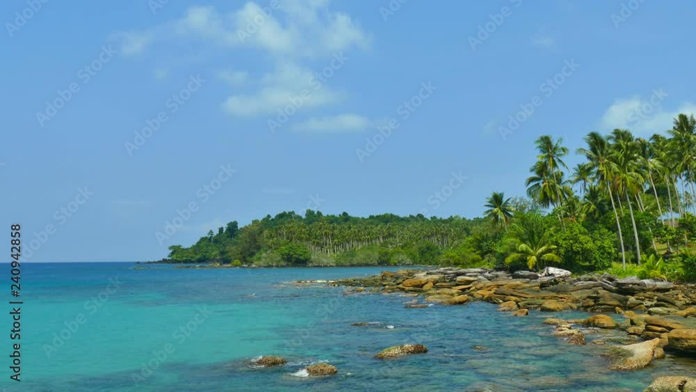 Nature with tropical sea and beach on white cloud and blue sky Nature with tropical sea and beach on white cloud and blue sky