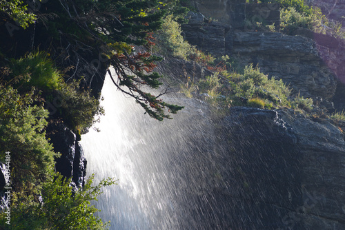 Waterfalls in early morning light in Glacier Narional Park. photo