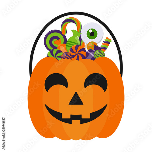 Halloween Candy Bucket and Candies - Jack O Lantern Halloween candy bucket with handle holding many colorful Halloween candies isolated on white background