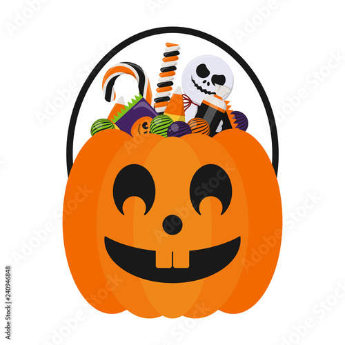 Halloween Candy Bucket and Candies - Jack O Lantern Halloween candy bucket with handle holding many colorful Halloween candies isolated on white background