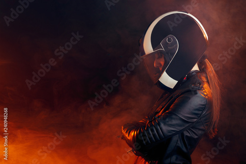 Wallpaper Mural Biker Woman with Helmet and Leather Outfit Portrait