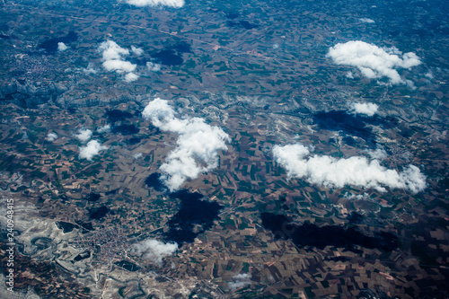 Canvastavla Mountain aerial view. houses and fields. clouds