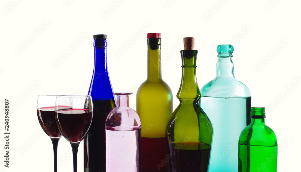 Bottles of wine and a glasses of wine. Isolated on a white background Bottles of wine and a glasses of wine. Isolated on a white background