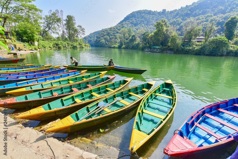 Green and Yellow Rowboats on Phewa Lake in Pokhara
