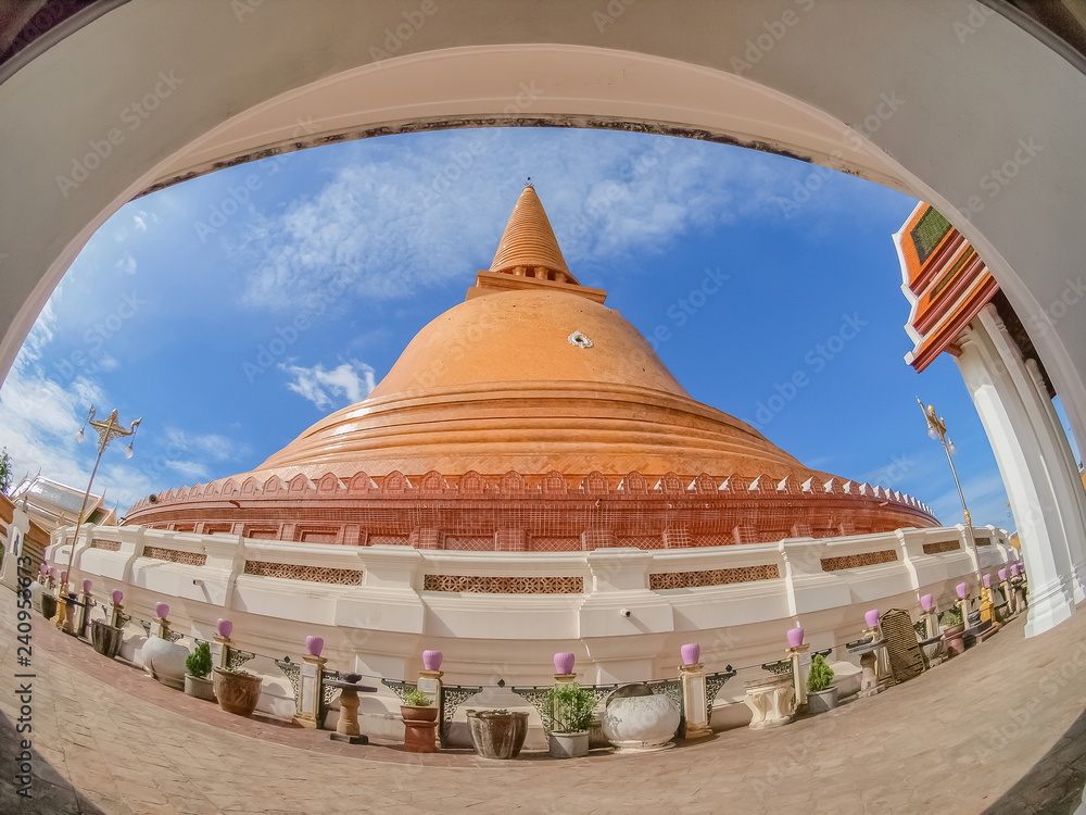 Phra Pathommachedi or Phra Pathom Chedi famous stupa know as the largest stupa in Thailand with blue sky background, Nakhon Pathom Province, Thailand.