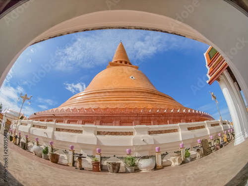 Phra Pathommachedi or Phra Pathom Chedi famous stupa know as the largest stupa in Thailand with blue sky background, Nakhon Pathom Province, Thailand.