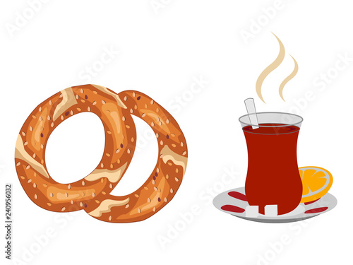 Cup of steaming turkish tea with turkish simit