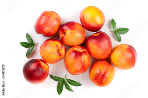 ripe nectarine with leaves isolated on white background. Top view. Flat lay pattern