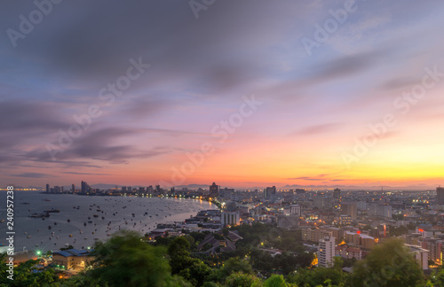 Pattaya City and Sea with suset, Thailand. Pattaya city skyline and pier at sunset in Pattaya Chonburi Thailand