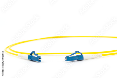 fiber optic single mode small form factor LC patch cord jumper with blue connector isolated on white background photo