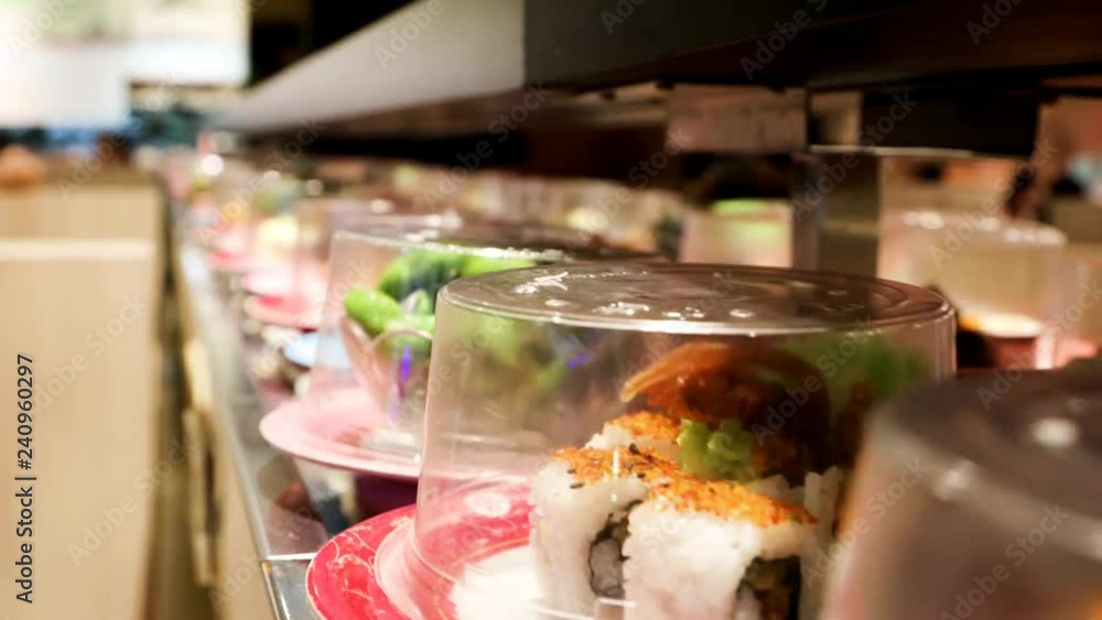 Close-up of delicious sushi moving on conveyor belt at sushi bar restaurant
Close-up of delicious sushi moving on conveyor belt at sushi bar restaurant