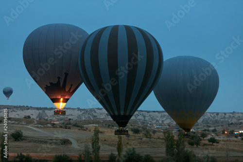 Travel. Hot Air Balloons Flying Above Valley In Early Morning