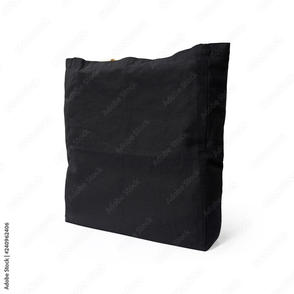 Black fabric bag on isolated background with clipping path. Shopping pouch textile for montage or your design template. Black fabric bag on isolated background with clipping path. Shopping pouch textile for montage or your design template.