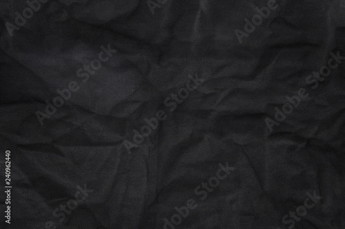 Abstract fabric texture background. Crumpled canvas textile material.