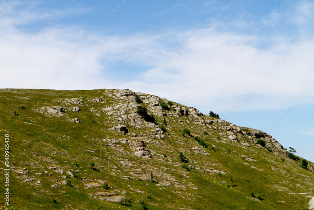 Photo of nature - beautiful petrous mountain slope with bright blue sky