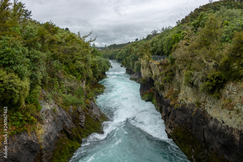 Waikato river flowing through Huka Falls canyon, Taupo, New Zealand photo