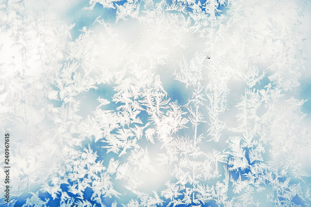 frozen window: abstract frosty background, winter pattern, frost patterns on glass frozen window: abstract frosty background, winter pattern, frost patterns on glass