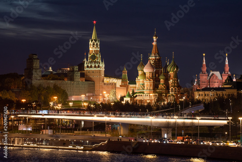 Night view of Moscow Kremlin and St. Basil s Cathedral with Soaring Bridge of Zaryadie park
