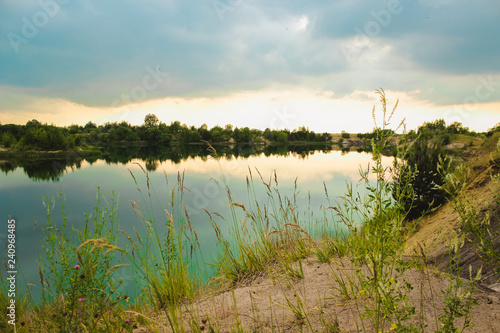 Blue chalk quarries landscape closeup in summertime. City Bereza, Belarus photo