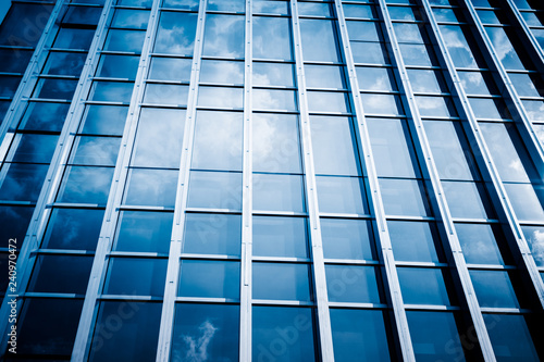 Clouds Reflected in Windows of Modern Office Building.