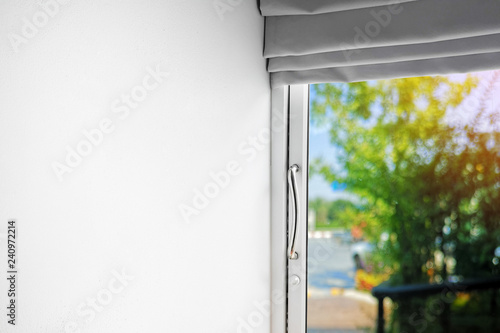 Background atmosphere in the room. Look out through the door glass in the summer there is a bright sky. with clipping path and empty space for text.