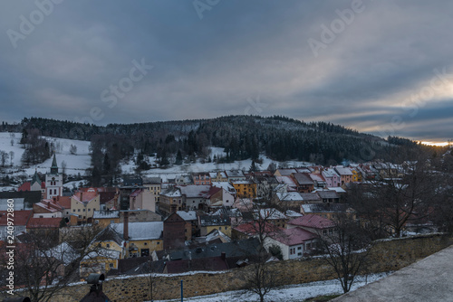 Vimperk town in cold winter evening in sunset time photo