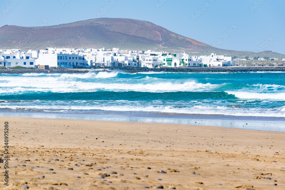 Famara Beach, popular surfing beach in Lanzarote, Canary Islands, Spain