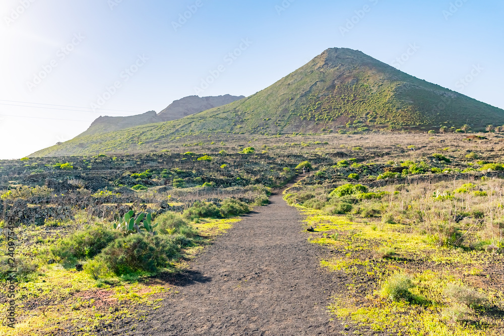 Fototapeta premium Walking trail road on The Vulcano La Corona near Ye village, north of Lanzarote, Canary Islands, Spain
