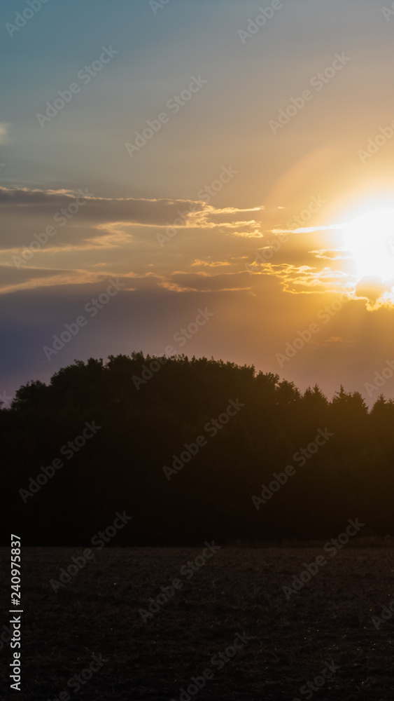Fototapeta premium Smartphone HD wallpaper of beautiful sunset with spectacular clouds near Ramsdorf - Bavaria - Germany
