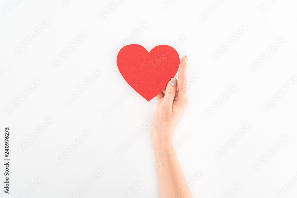 cropped shot of woman holding red heart symbol isolated on white, st valentine day concept cropped shot of woman holding red heart symbol isolated on white, st valentine day concept