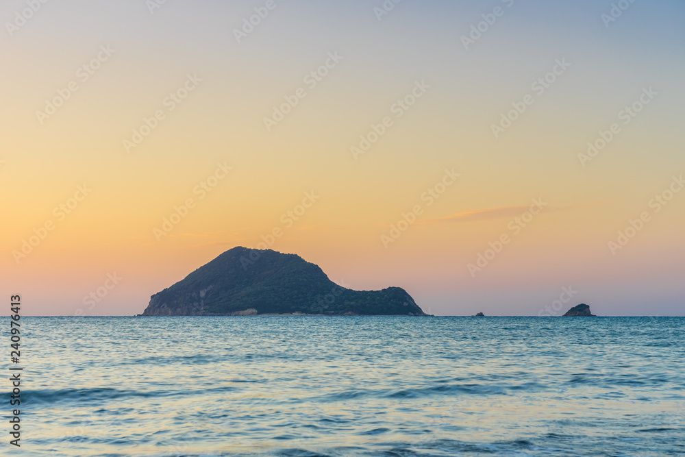 Greece, Zakynthos, Beautiful marathonisi island also called turtle island in sunrise atmosphere
