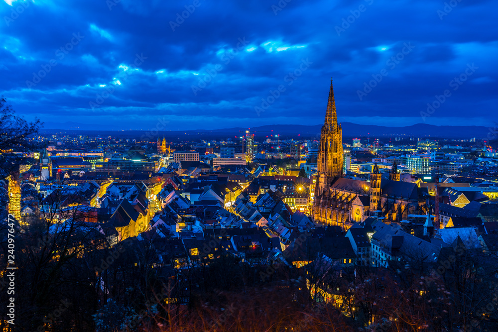 Germany, City lights and skyline of freiburg im Breisgau from above