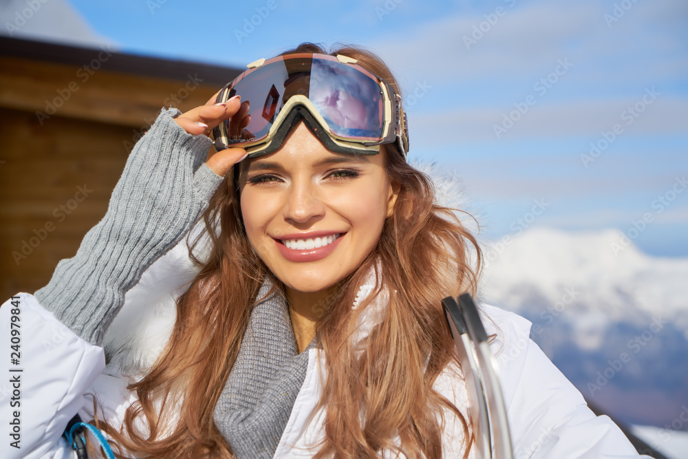 Winter woman portrait outdoors. Snow winter woman portrait outdoors on snowy white winter day Winter woman portrait outdoors. Snow winter woman portrait outdoors on snowy white winter day
