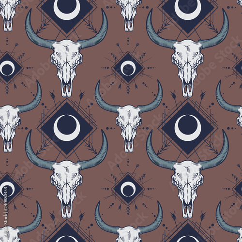 Vector seamless pattern with bull skulls in engraving technique and boho ornament. 