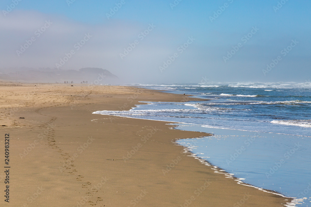 A misty Ocean Beach in San Francisco, on a summer's morning