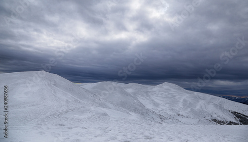 Gray sky and snow mountains © Vasyl