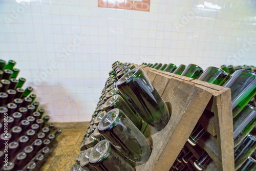 Stands with white wine sparkling bottles
