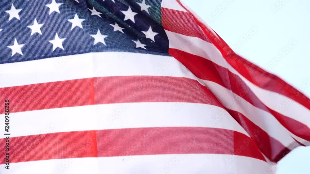 Close up of USA united states of america flag waving on wind. National landmark concept Close up of USA united states of america flag waving on wind. National landmark concept