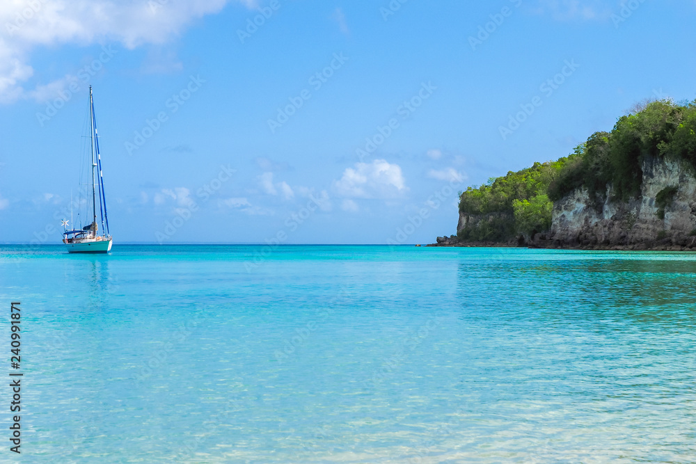 Yacht moored at Anse Canot, Marie Galante island, Guadeloupe