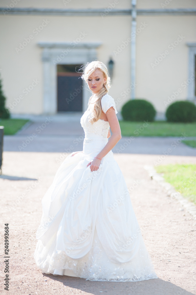 Beautiful sensual bride blonde in wedding dress Beautiful sensual bride blonde in wedding dress