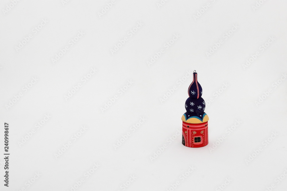 Obraz premium wood painted cupola tower toy, orthodox towers toy, souvenir russian style isolated on white background.