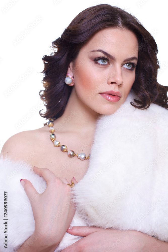 Portrait of a young beautiful brunette girl in a white fur collarover Portrait of a young beautiful brunette girl in a white fur collarover