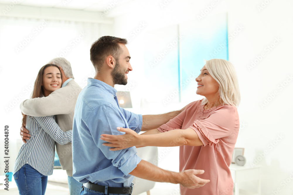 Fototapeta premium Happy family at home. Reunion of generations